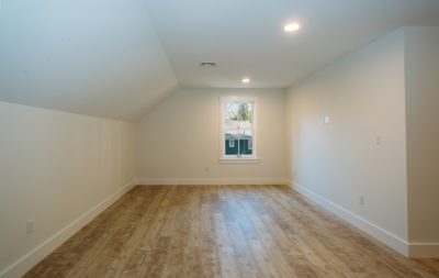 Upstairs bedroom, New Hampshire, "Modern Cottage," Custom home design and construction by Don Madore. New England home builders.