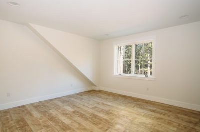 Upstairs bedroom, New Hampshire, "Modern Cottage," Custom home design and construction by Don Madore. New England home builders.